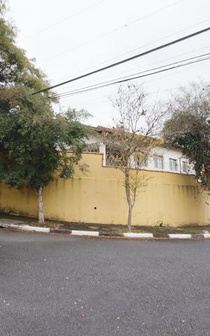 Casa à venda com 418m², 6 quartos e 4 vagasFachada