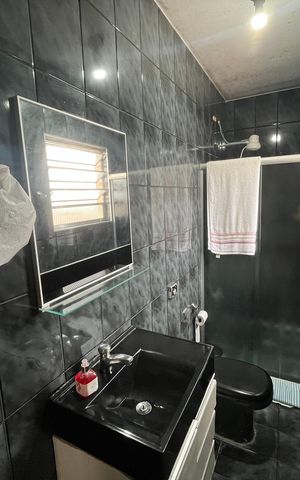 Casa à venda com 250m², 3 quartos e 3 vagas Casa à venda com 250m², 3 quartos e 3 vagasBanheiro da Suíte 1