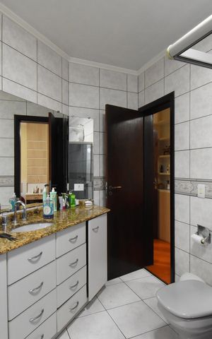 Casa à venda com 202m², 3 quartos e 3 vagasBanheiro da Suíte