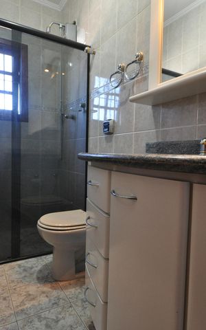 Casa à venda com 220m², 3 quartos e 3 vagasBanheiro do Quarto Suíte