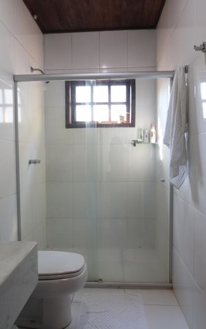 Casa de condomínio à venda com 275m², 5 quartos e 5 vagasBanheiro Social