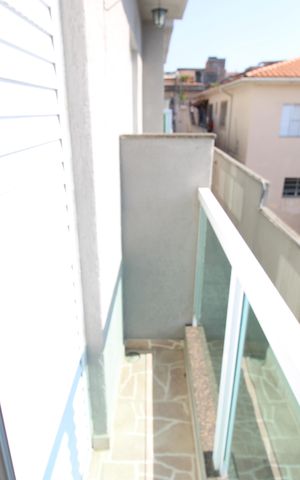 Casa de condomínio à venda com 65m², 2 quartos e 1 vagaQuarto 1 - Varanda