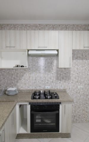 Casa de condomínio à venda com 65m², 2 quartos e 1 vagaCozinha