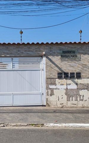 Casa de condomínio à venda com 65m², 2 quartos e 1 vaga Casa de condomínio à venda com 65m², 2 quartos e 1 vagaFachada
