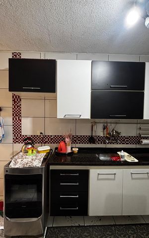 Casa à venda com 138m², 3 quartos e 2 vagas Casa à venda com 138m², 3 quartos e 2 vagasCozinha