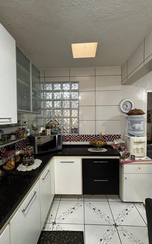 Casa à venda com 138m², 3 quartos e 2 vagas Casa à venda com 138m², 3 quartos e 2 vagasCozinha