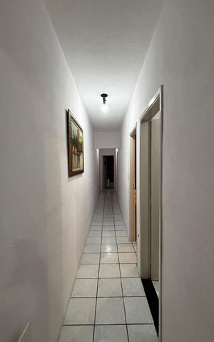 Casa à venda com 138m², 3 quartos e 2 vagas Casa à venda com 138m², 3 quartos e 2 vagasCorredor