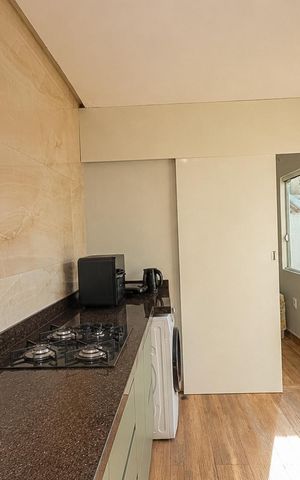 Casa de condomínio para alugar com 67m², 2 quartos e 2 vagas Casa de condomínio para alugar com 67m², 2 quartos e 2 vagasCozinha e Área de Serviço