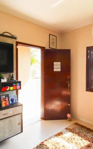 Casa à venda com 169m², 3 quartos e 3 vagas Casa à venda com 169m², 3 quartos e 3 vagasSala