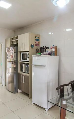 Casa à venda com 169m², 3 quartos e 3 vagas Casa à venda com 169m², 3 quartos e 3 vagasCozinha