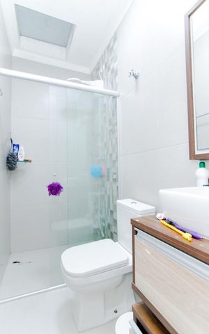 Casa de condomínio à venda com 111m², 3 quartos e 2 vagasBanheiro da Suíte