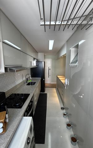 Apartamento à venda com 75m², 3 quartos e 2 vagas Apartamento à venda com 75m², 3 quartos e 2 vagasCozinha e Área de Serviço