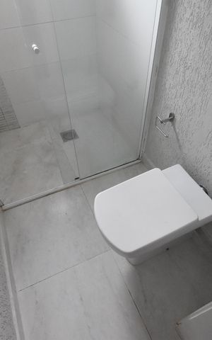 Casa de condomínio para alugar com 123m², 2 quartos e 1 vagaBanheiro da Suíte