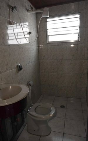 Casa à venda com 249m², 4 quartos e 3 vagasBanheiro social
