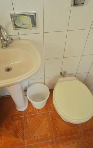 Casa à venda com 400m², 3 quartos e 3 vagasEdícula - Banheiro da Suíte 