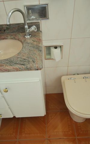 Casa à venda com 400m², 3 quartos e 3 vagasBanheiro - Suíte 2 