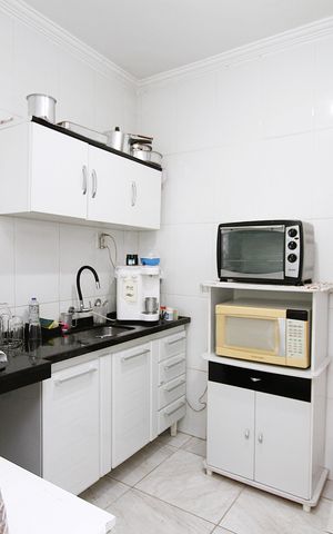 Casa para alugar com 140m², 2 quartos e 2 vagasCozinha