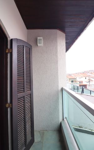 Casa à venda com 242m², 3 quartos e 5 vagasQuarto 1 - Suíte Sacada 