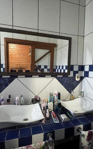 Casa à venda com 390m², 5 quartos e 2 vagas