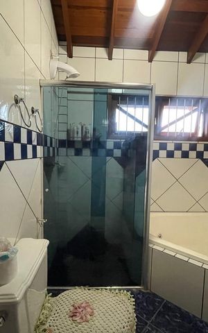 Casa à venda com 390m², 5 quartos e 2 vagas