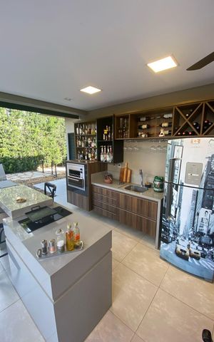 Casa de condomínio à venda com 406m², 4 quartos e 4 vagas