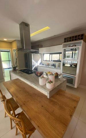 Casa de condomínio à venda com 406m², 4 quartos e 4 vagas