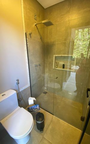 Casa de condomínio à venda com 406m², 4 quartos e 4 vagas