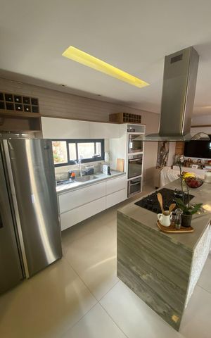 Casa de condomínio à venda com 406m², 4 quartos e 4 vagas