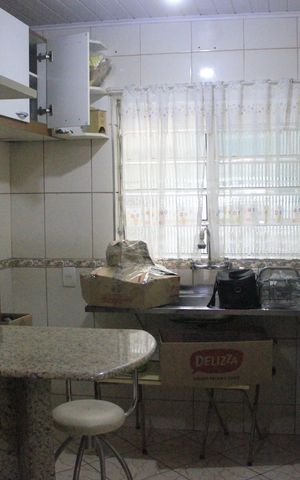 Casa à venda com 180m², 4 quartos e 2 vagasCozinha da edícula 