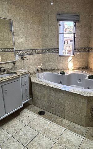 Casa à venda com 536m², 4 quartos e 11 vagas Casa à venda com 536m², 4 quartos e 11 vagasBanheiro da Suíte 1