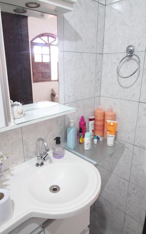 Casa à venda com 434m², 4 quartos e 3 vagasBanheiro social