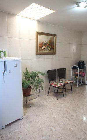 Casa à venda com 434m², 4 quartos e 3 vagasCozinha e Área de Serviço