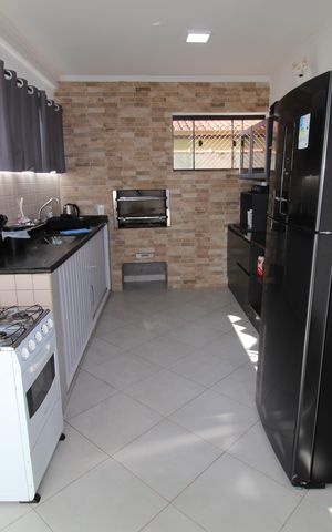 Casa de condomínio para alugar com 327m², 6 quartos e 4 vagasCozinha