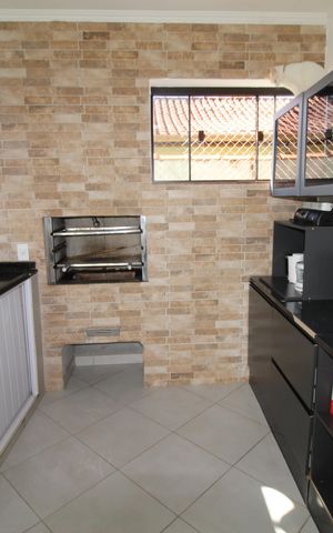 Casa de condomínio para alugar com 327m², 6 quartos e 4 vagasCozinha
