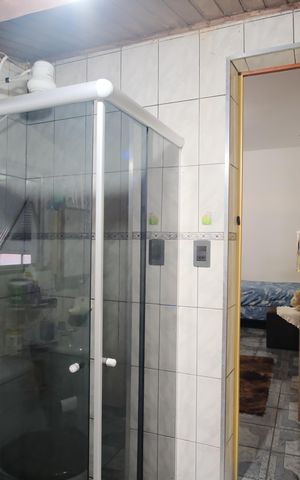 Casa à venda com 186m², 4 quartos e sem vagaBanheiro da Suíte