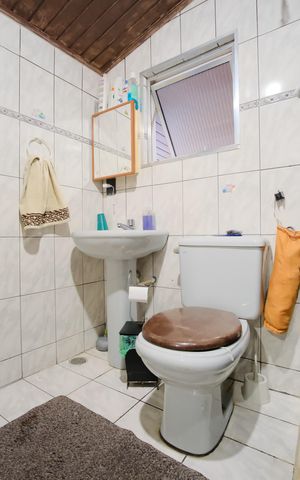 Casa à venda com 186m², 4 quartos e sem vagaBanheiro da Suíte