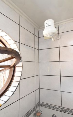 Casa à venda com 242m², 3 quartos e 2 vagasBanheiro 2