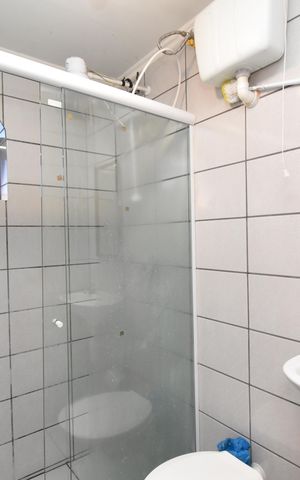 Casa à venda com 242m², 3 quartos e 2 vagasBanheiro da Área de Serviço