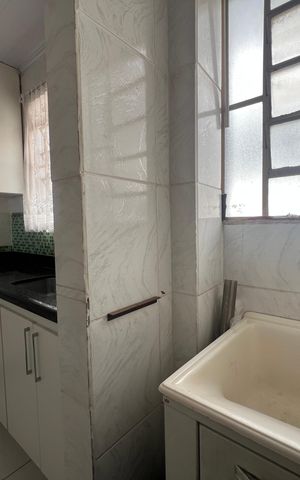 Casa à venda com 52m², 3 quartos e sem vaga Casa à venda com 52m², 3 quartos e sem vagaCozinha e Área de Serviço