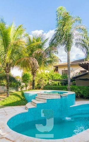 Casa de condomínio à venda com 472m², 4 quartos e 3 vagas