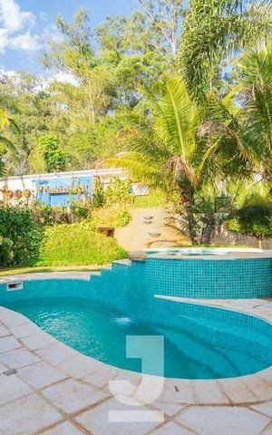 Casa de condomínio à venda com 472m², 4 quartos e 3 vagas