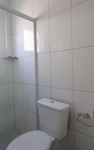 Casa de condomínio à venda com 110m², 2 quartos e 1 vagaBanheiro da Suíte 2