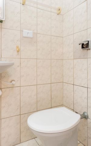 Casa para alugar com 130m², 2 quartos e 1 vagaBanheiro da Suíte