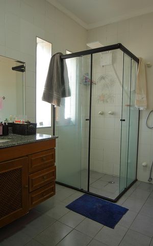 Casa à venda com 377m², 4 quartos e 4 vagasBanheiro Suíte 1