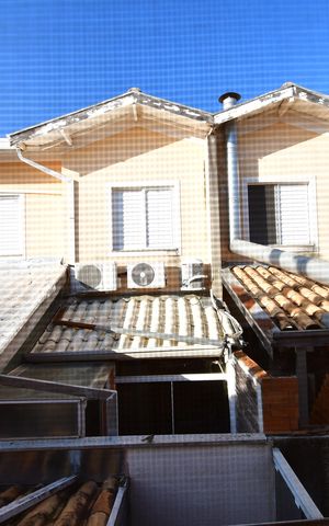 Casa de condomínio à venda com 100m², 3 quartos e 2 vagasQuarto 1 - Vista