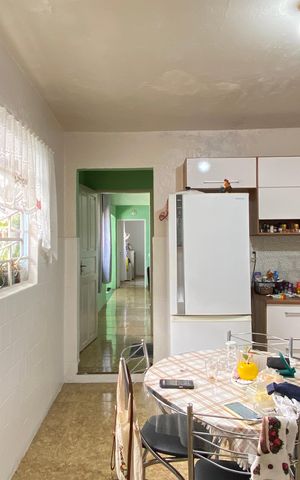 Casa à venda com 159m², 2 quartos e 3 vagas Casa à venda com 159m², 2 quartos e 3 vagasCozinha