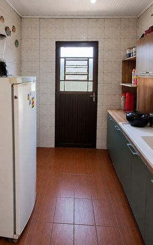 Casa à venda com 106m², 2 quartos e 2 vagas Casa à venda com 106m², 2 quartos e 2 vagasCozinha