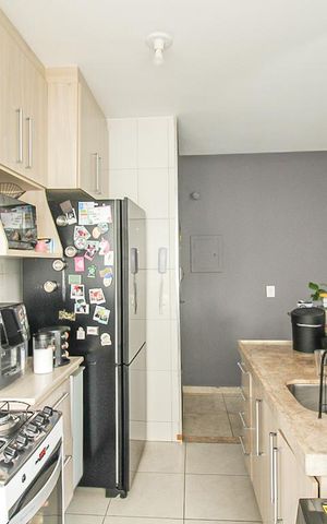 Apartamento à venda com 57m², 2 quartos e 2 vagas Apartamento à venda com 57m², 2 quartos e 2 vagasCozinha e Área de Serviço