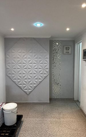 Casa à venda com 250m², 3 quartos e 4 vagas Casa à venda com 250m², 3 quartos e 4 vagasQuarto da Garagem