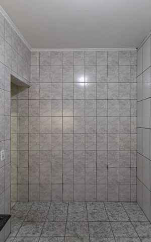 Casa à venda com 218m², 1 quarto e 2 vagas Casa à venda com 218m², 1 quarto e 2 vagasCozinha e Área de Serviço